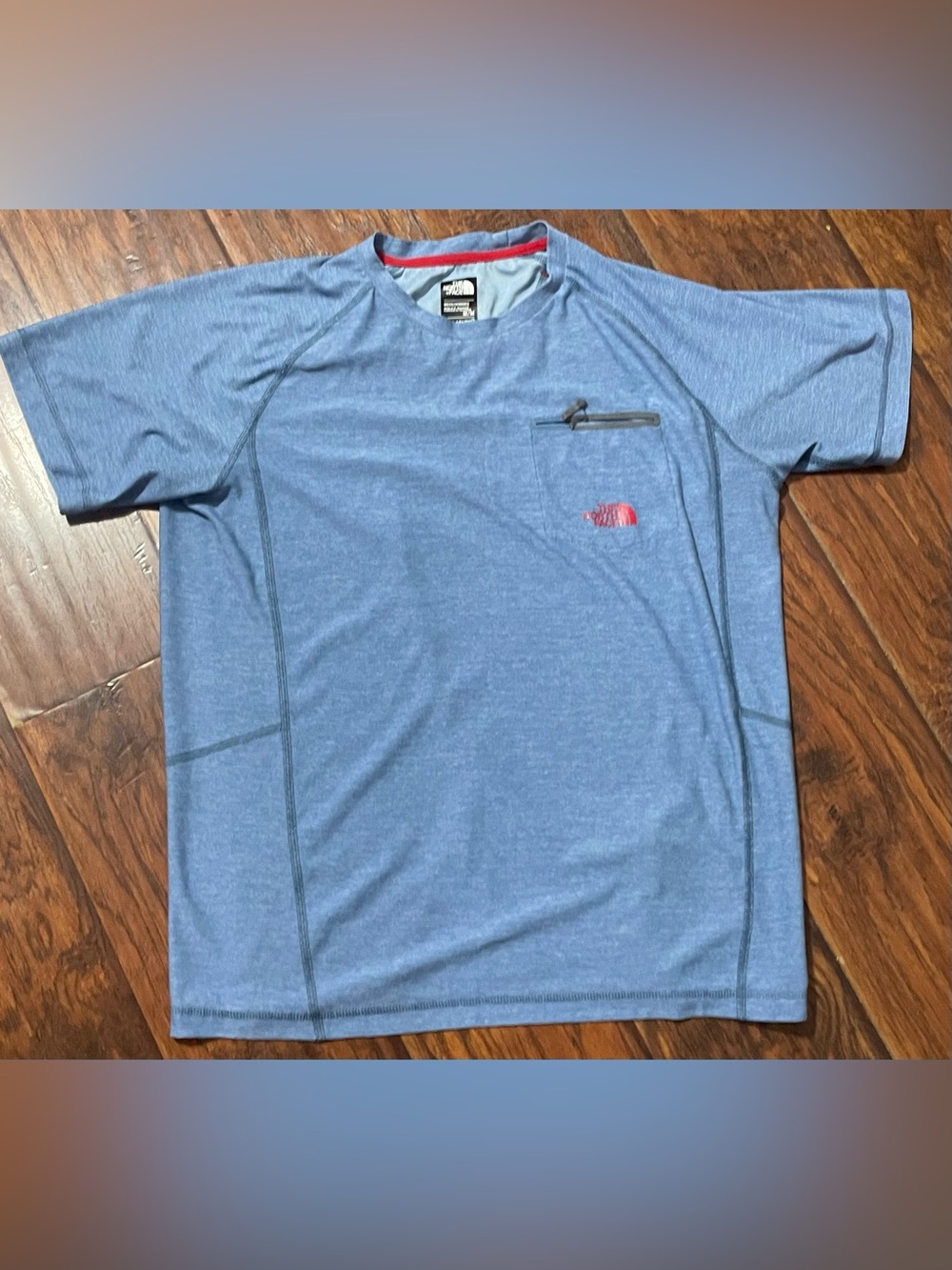 The North Face Heather Blue Short Sleeve Tech Tee with Red Logo